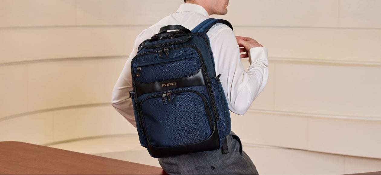 EVERKI backpack worn by a business traveler