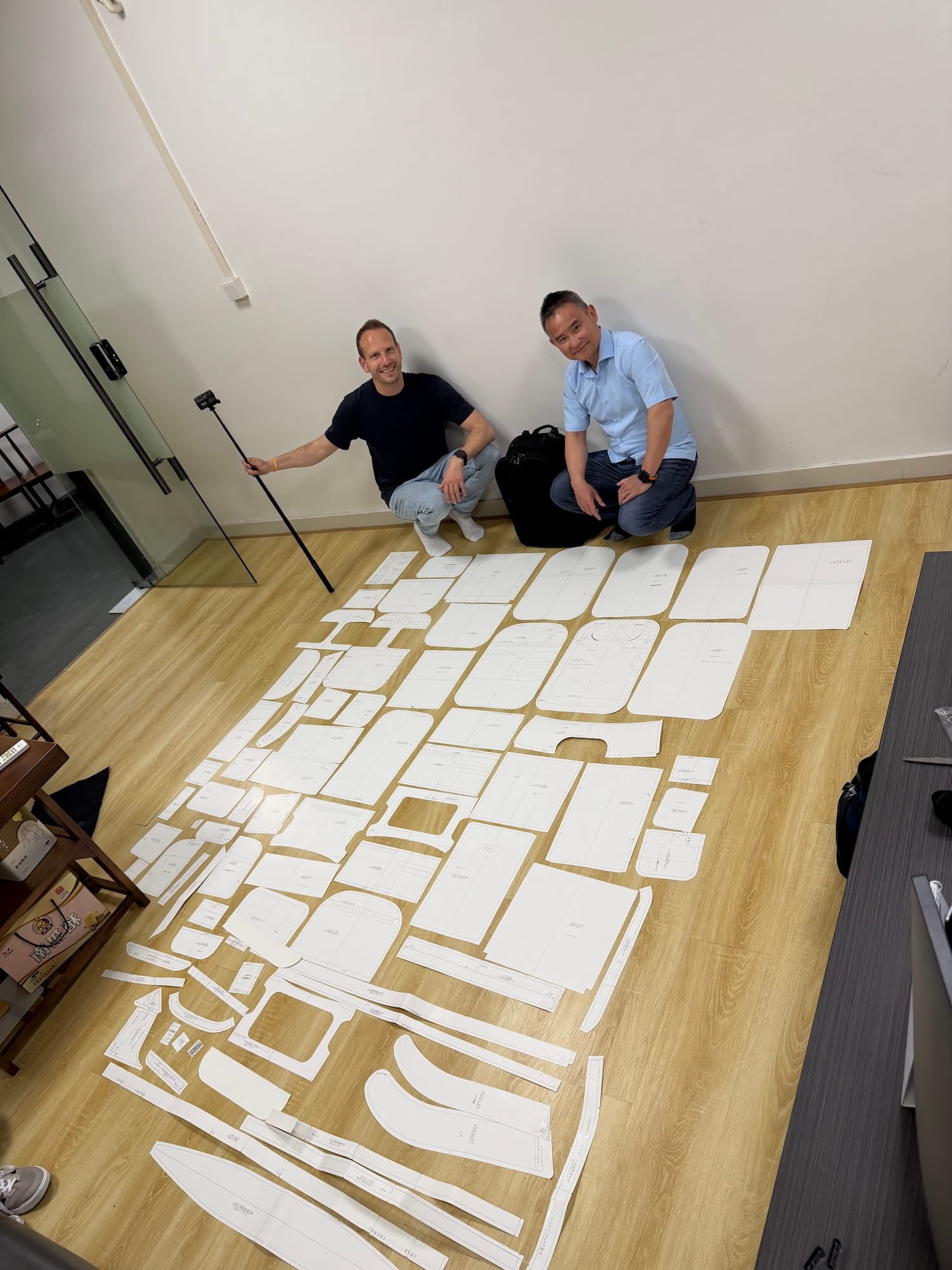 Over 100 paper pattern pieces of EVERKI ONE laid out at full scale