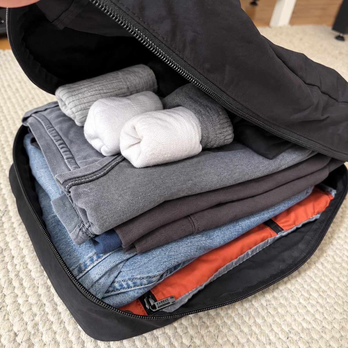 The L-Cube packed with clothes