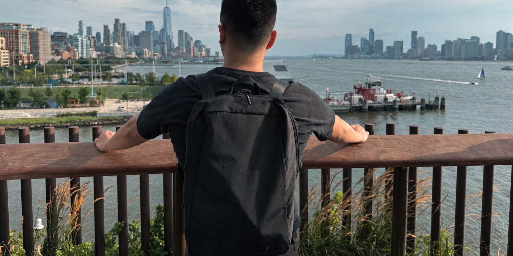 The L-Cube worn as a daypack overlooking the New York skyline