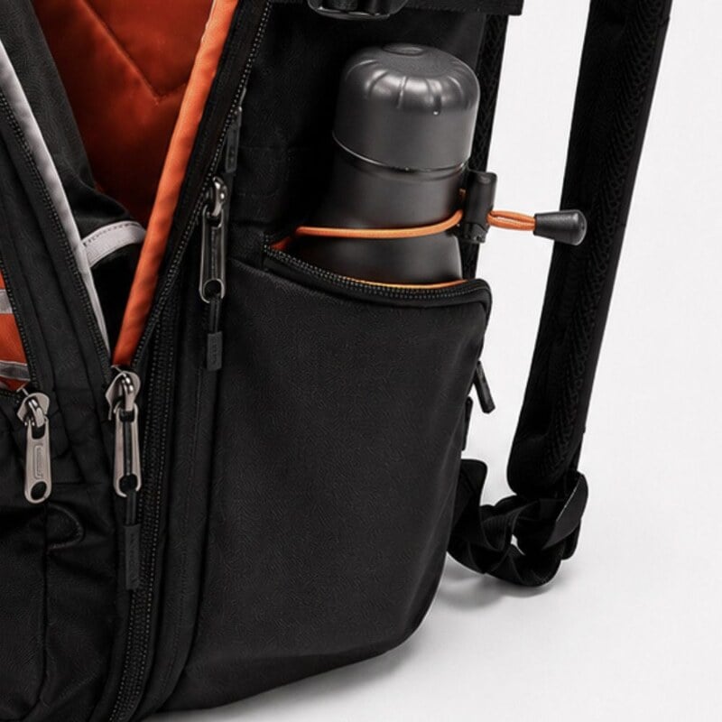 EKP1 zip-close side pocket holding a water bottle