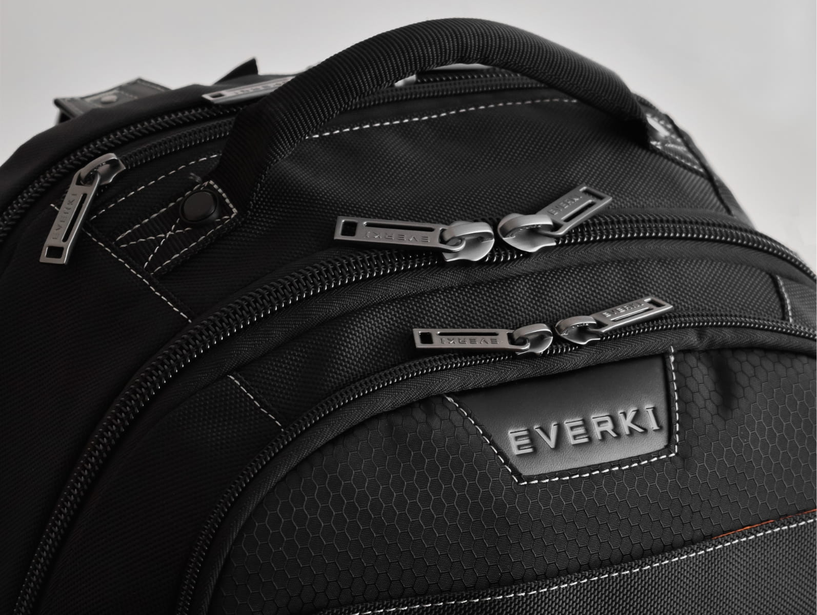 Close-up of heavy-duty zipper pulls and hardware