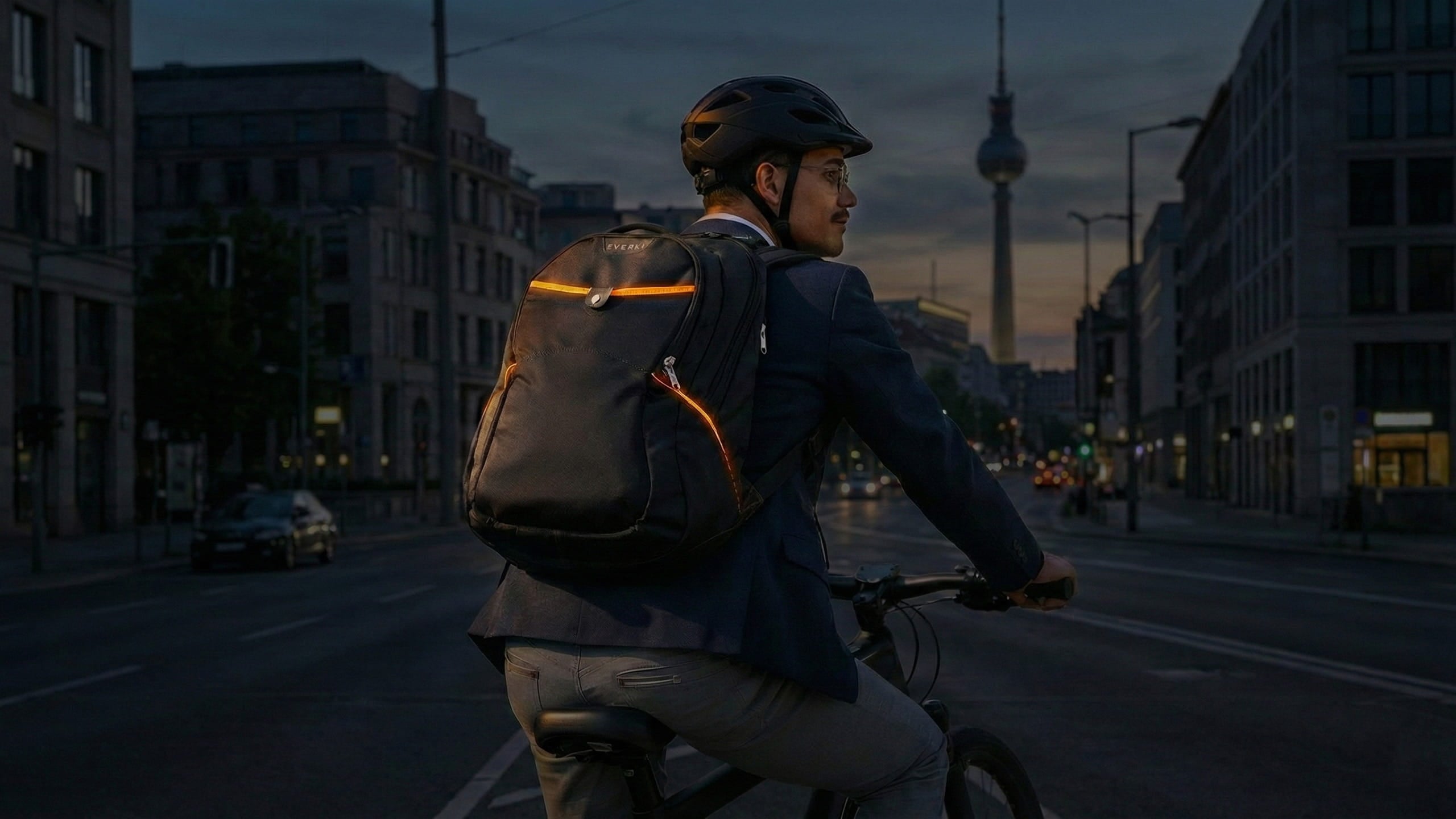 Glide Backpack shown in a commuter setting